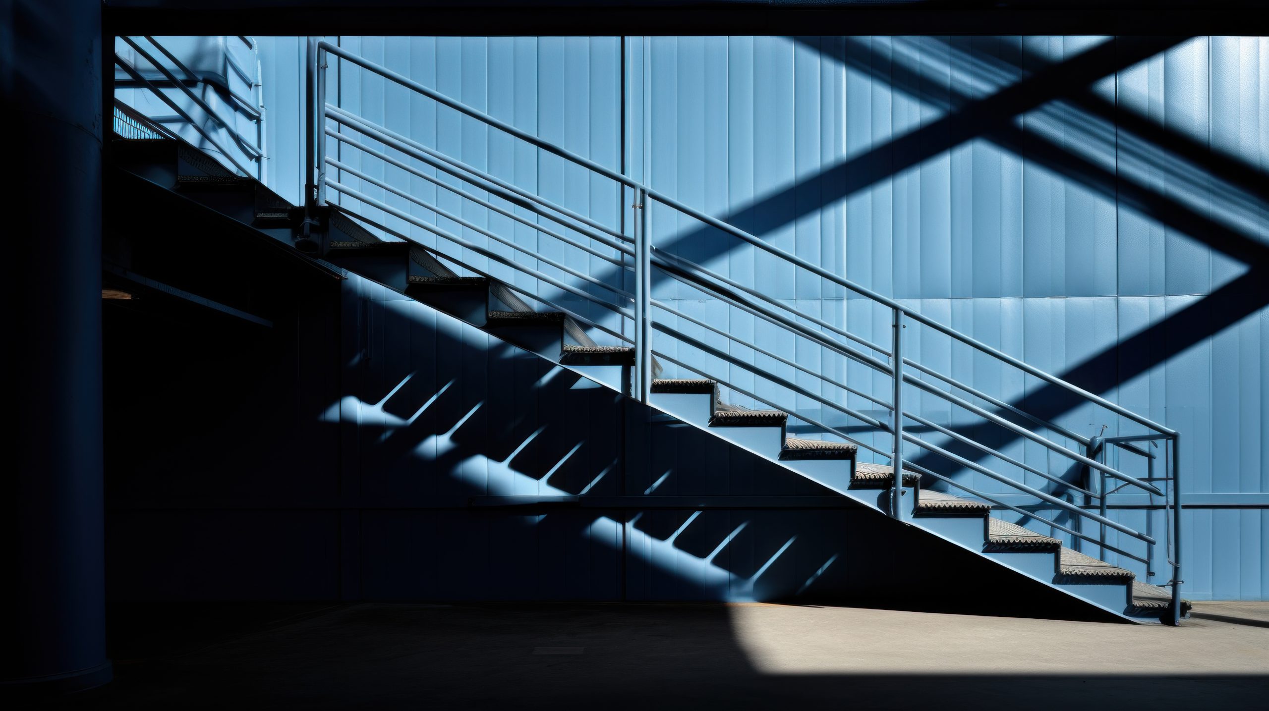 Complex play of lines and shadows in a warehouse.